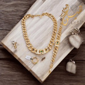 طقم بالحجر الأخضر طقم ذهب عيار 18